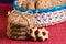 homemade oat cookies with sunflower seeds in and rear blue checkered basket on wooden table