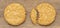 Homemade oat and wholemeal biscuits isolated on brown wooden table background. Its are a nutrient-rich food associated with