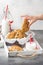 Homemade oatmeal cookies with chocolate and banana, milk in a glass with a straw, kids hands. Delicious dessert, Breakfast (lunch