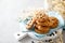 Homemade oatmeal cookies with chocolate drops and milk for breakfast