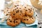 Homemade oatmeal cookies with chocolate drops and milk for breakfast