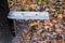 Homemade old bench near a tree.