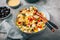 Homemade orzo pasta salad with feta, olives, tomatoes