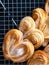 Homemade Palmier Puff Pastry. Delicious french palmier cookies with sugar on a cooling rack. Palmiers, elephant ear, puff pastry