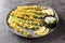 Homemade Panko Breaded Asparagus with Assorted Spices close-up on a plate. Horizontal