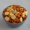 Homemade Party Snack Mix with Crackers and Pretzels in a Bowl, side view. Close-up