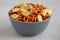 Homemade Party Snack Mix with Crackers and Pretzels in a Bowl, side view. Close-up