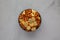 Homemade Party Snack Mix with Crackers and Pretzels in a Bowl, top view. Flat lay, overhead, from above