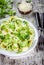 Homemade pasta orecchiette with broccoli, Parmesan cheese and basil