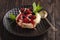 Homemade Pavlova dessert with raspberries and blueberries.