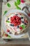 Homemade Pavlova dessert with raspberries, meringue and raspberry mousse