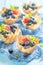 Homemade phyllo cups made of cream and fresh berry fruits