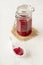 Homemade pickled beetroots in jar on wooden table