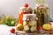 Homemade pickled patissons, tomatoes and cucumbers on grey background with fresh ingredients, Closeup. Horizontal format