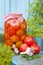 Homemade pickled tomatoes in glass jar. Fresh vegetables, dill a