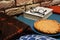 Homemade pie with salmon and cheese. Conceptual image with warm home atmosphere, blanket, glasses and book