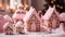 Homemade Pink Christmas Gingerbread House. Christmas house made from ginger cookies decorated in Christmas spirit with tree in