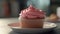 A homemade pink cupcake with creamy icing generated by AI
