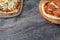 Homemade pizza detail on wooden background