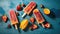 Homemade popsicles with fresh strawberries and ice cubes on blue background.