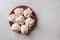 Homemade popular dessert meringue on a ceramic plate on a white wood table