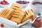 Homemade puff pastry pies with raspberries and blueberries