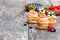 homemade puff pastry stuffed with cream and berries on the rustic table