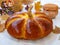 Homemade pumpkin shaped bread located on a white background