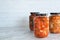 Homemade radish kimchi in a glass jar