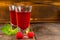 Homemade raspberry juice or liqueur with mint