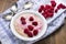 Homemade raspberry rice pudding with fresh raspberries
