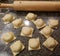 Homemade raviolis with rolling pin dinner cooking