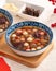 Homemade red and white tangyuan with syrup soup, dried longan pulp, red dates for Winter solstice