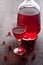 Homemade red wine with red currant berries