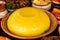 Homemade Romanian Food with polenta, meat, cheese and vegetables. Delicious corn porridge in clay dishes.