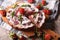 Homemade rustic strawberry pie with mint on a cutting board