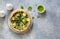 Homemade rustic vegetable pie  quiche with spinach, zucchini and green peas
