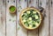 Homemade rustic vegetable pie  quiche with spinach, zucchini and green peas