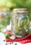 Homemade salted cucumbers in glass jar