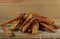 Homemade Salted French Fries On Wooden Background.