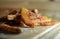 Homemade Salted French Fries On Wooden Background close up.