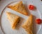 Homemade samosas on on plate with small tomatoes, home cooking