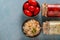 Homemade Sauerkraut and salted tomatoes in a bowls and a glass jars on a light blue background, Concept Fermented