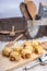 Homemade sausage rolls on a wooden plate, mini sausage rolls on wooden plate.