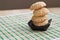 Homemade sesame seed cookies on black plate