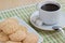 Homemade sesame seed cookies and cup of coffee