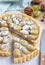 Homemade shortbread dough grape tart with walnut praline, vertical