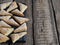 Homemade shortbread puff pastry Triangle on a wooden ancient rustic background. Side view. Place for text