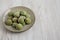 Homemade Soft Amaretti Cookies with Pistachio on a Plate, side view