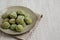 Homemade Soft Amaretti Cookies with Pistachio on a Plate, side view. Copy space